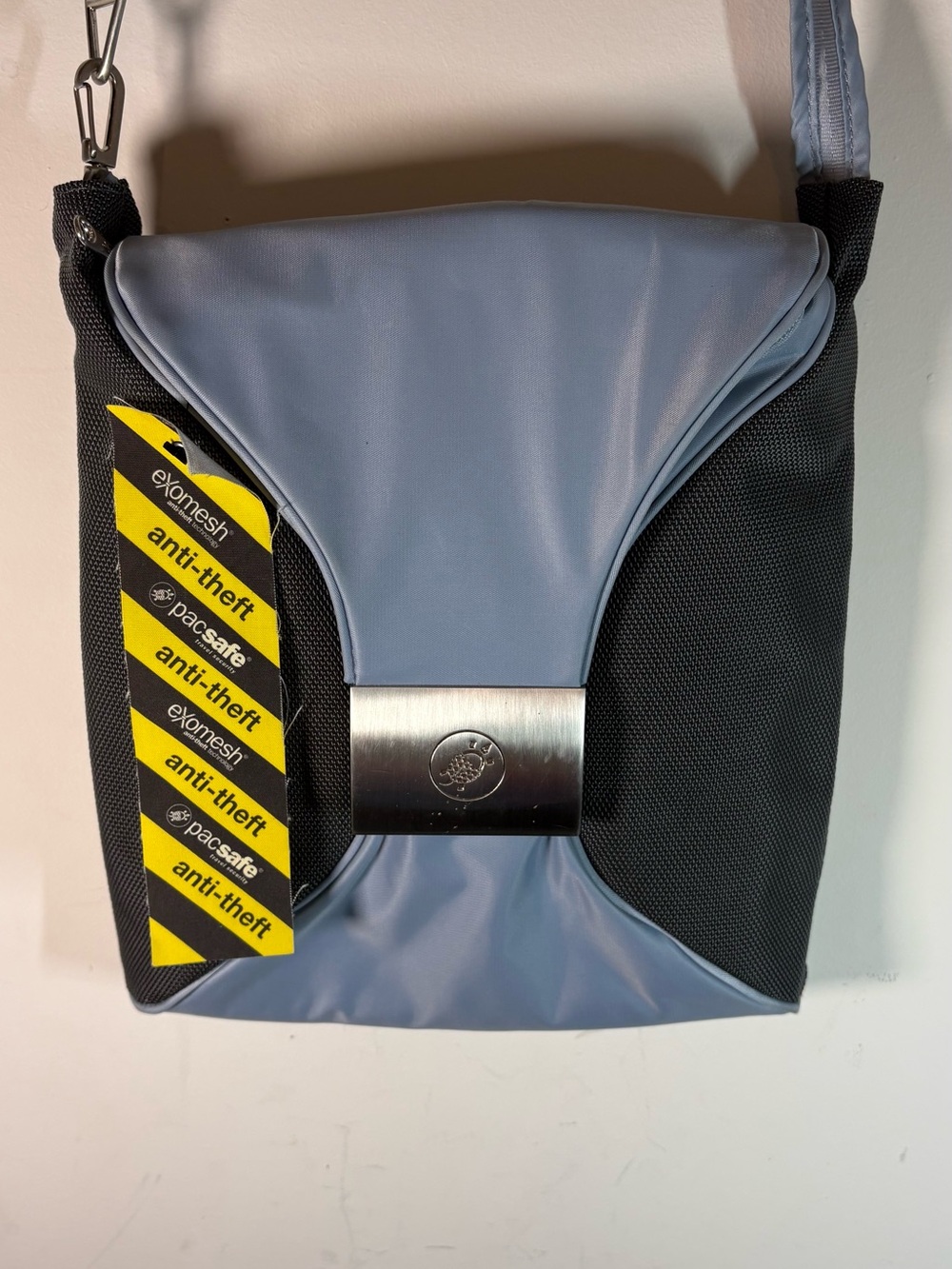 Pacsafe Anti-Theft Crossbody Bag in Light Blue and Black